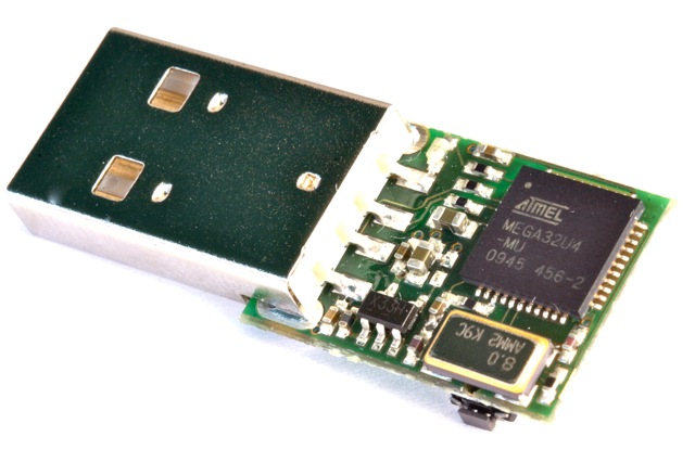 USB stick board with its Atmel controller, case removed